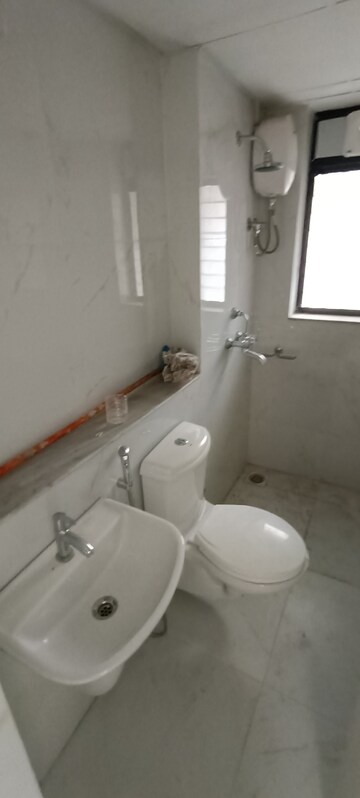 Bathroom in 2 BHK Apartment at Runwal Gardens, Dombivli East – for Rent