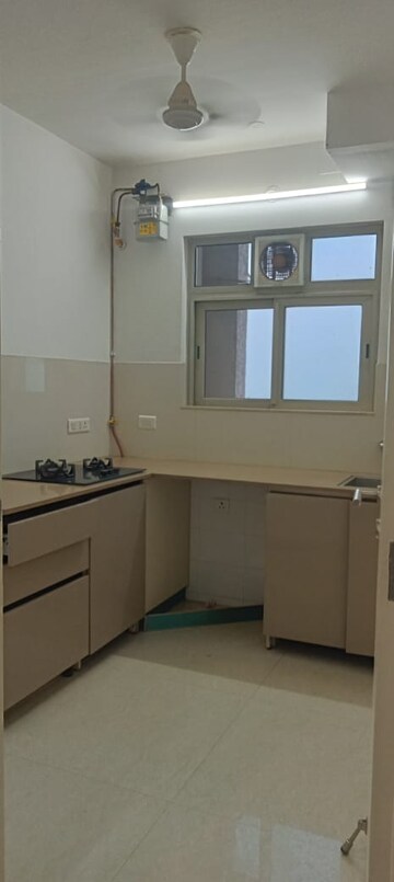 Kitchen in 1 BHK Apartment at Hiranandani Estate Solitaire C, Ghodbunder Road – for Rent