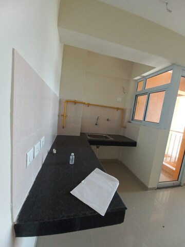 Kitchen in 1 BHK Apartment at Wave Dream Homes, Wave City – for Sale
