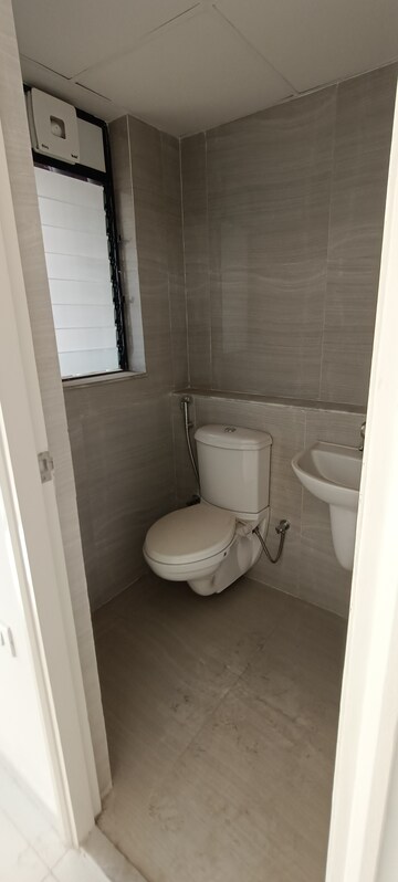 Bathroom in 2 BHK Apartment at Runwal Gardens, Dombivli East – for Rent