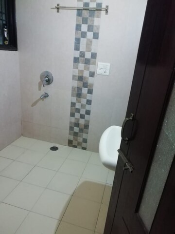 Bathroom in 3 BHK Apartment at Dhakoli Village – for Rent