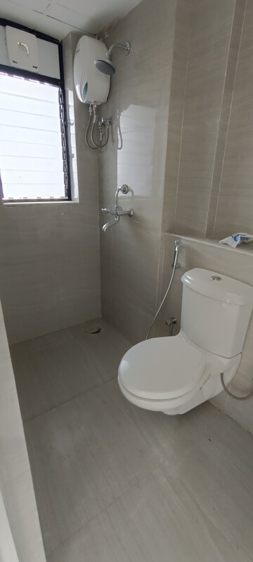 Bathroom in 1 BHK Apartment at Runwal Gardens, Dombivli East – for Sale