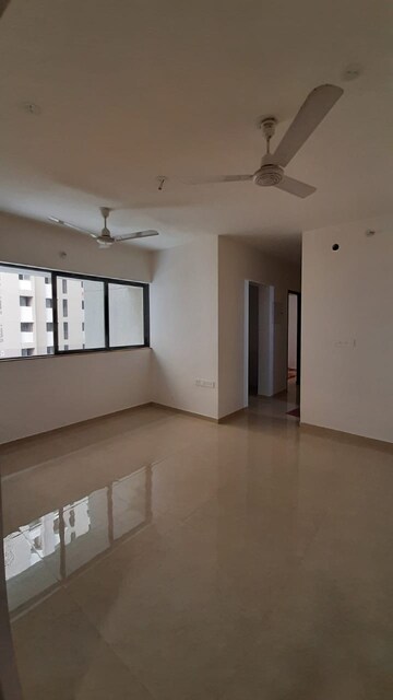 Living Room in 2 BHK Apartment at Lodha Palava Downtown, Dombivli East – for Rent