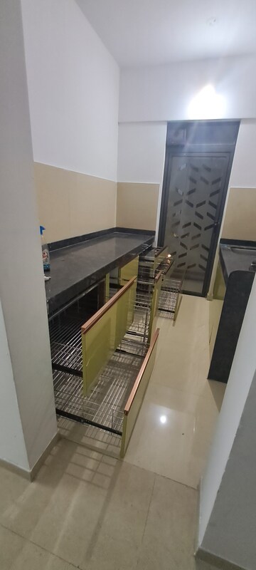 Kitchen in 2 BHK Apartment at Lodha Palava Downtown, Dombivli East – for Rent