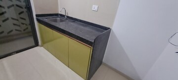 Kitchen in 2 BHK Apartment at Lodha Palava Downtown, Dombivli East – for Rent