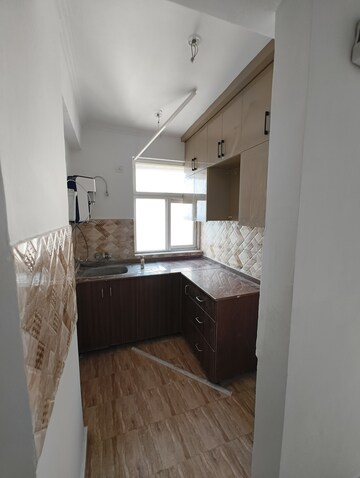 Kitchen in 2 BHK Apartment at Amrapali Leisure Park, Amrapali Leisure Valley – for Sale