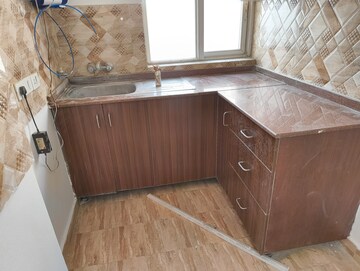 Kitchen in 2 BHK Apartment at Amrapali Leisure Park, Amrapali Leisure Valley – for Sale