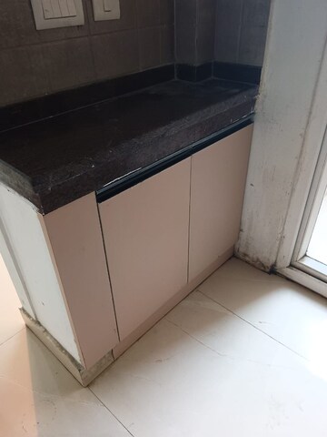 Kitchen in 2 BHK Apartment at Amrapali Golf Homes, Sector 4, Greater Noida – for Sale