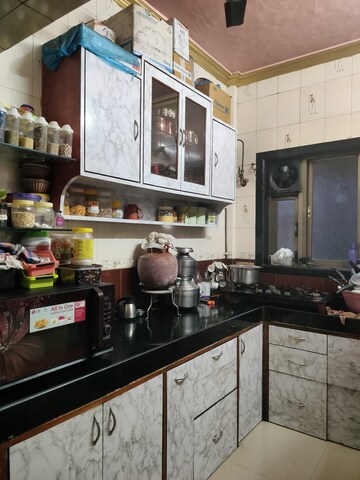 Kitchen in 1 BHK Apartment at Bharat CHS, Juinagar – for Sale