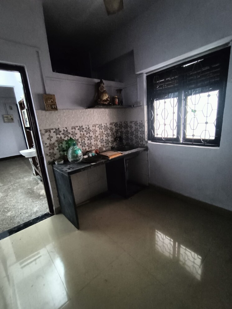 Kitchen, sai-om-chs 1 Bedroom 550 Sq.Ft. Apartment In Louis Wadi Thane 7983613