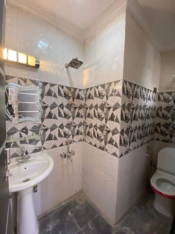Bathroom in 2 BHK Builder Floor at Freedom Fighters Enclave – for Rent