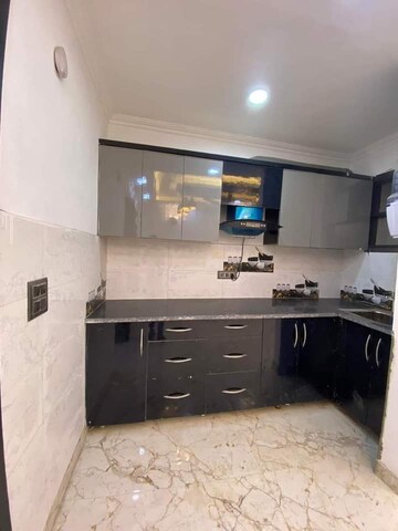 Kitchen in 2 BHK Builder Floor at Freedom Fighters Enclave – for Rent