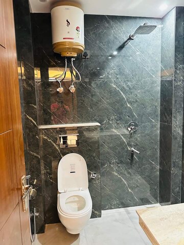 Bathroom in 2 BHK Builder Floor at Freedom Fighters Enclave – for Rent