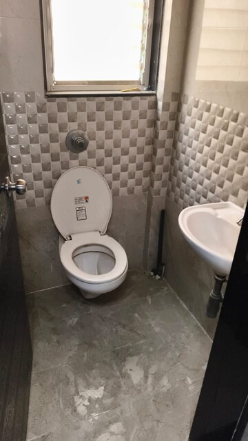 Bathroom in 1 BHK Apartment at Cosmos Orchid, Ghodbunder Road – for Sale