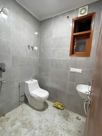 Bathroom in 1 BHK Builder Floor at Freedom Fighters Enclave – for Rent
