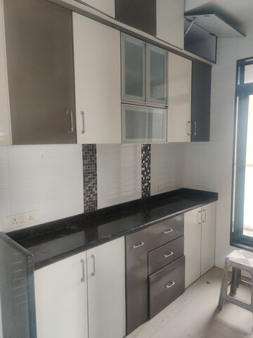 Kitchen in 2.5 BHK Apartment at Rustomjee Elanza, Malad West – for Rent