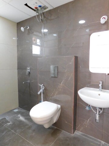 Bathroom in 3 BHK Apartment at Ambience Courtyard, Manikonda – for Rent