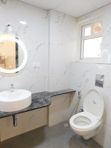 Bathroom in 3 BHK Apartment at Ambience Courtyard, Manikonda – for Rent
