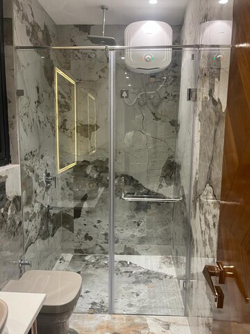 Bathroom in 4 BHK Builder Floor at DLF Atria, Dlf Phase ii – for Rent