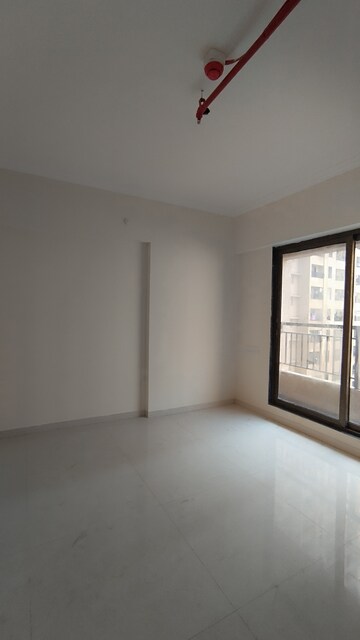 Master Bedroom in 1 BHK Apartment at Raunak City Sector 4 D4, Kalyan West – for Rent