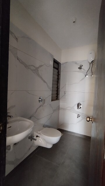 Bathroom in 1 BHK Apartment at Raunak City Sector 4 D4, Kalyan West – for Rent