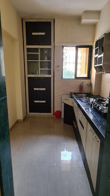 Kitchen in 1 BHK Apartment at Rosa Gardenia, Ghodbunder Road – for Sale
