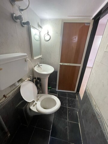 Bathroom in 1 BHK Apartment at Evershine Woods, Mira Road – for Rent