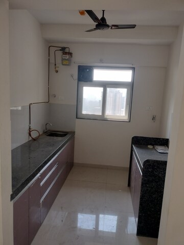 Kitchen in 2 BHK Apartment at Piramal Vaikunth, Balkum Pada – for Rent