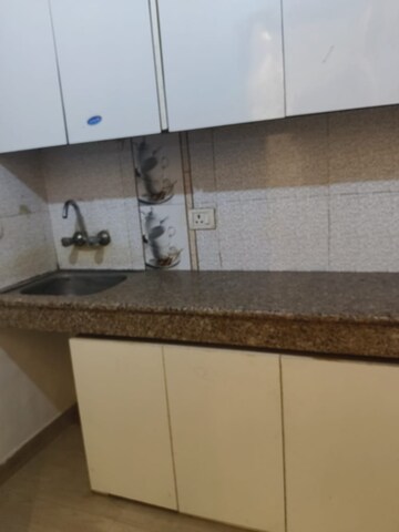 Kitchen in 1 RK Builder Floor at Ansal Sushant Lok I, Sector 43 – for Rent