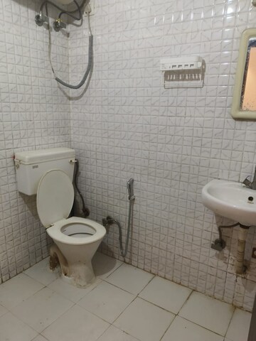 Bathroom in 1 RK Builder Floor at Ansal Sushant Lok I, Sector 43 – for Rent