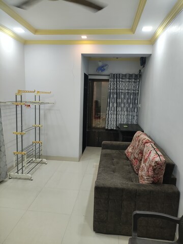 Living Room in 1 BHK Apartment at Kendriya Vihar Seawoods, Seawoods West – for Rent