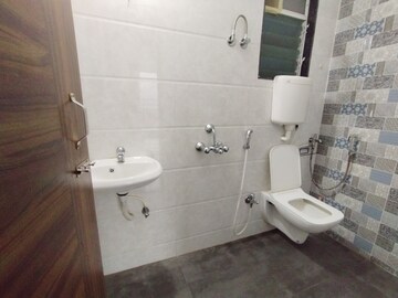 Bathroom in 2 BHK Apartment at Arihant Aarohi, Kalyan Shilphata Road – for Rent