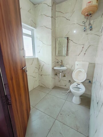Bathroom in 1 RK Builder Floor at Ansal Sushant Lok I, Sector 43 – for Rent