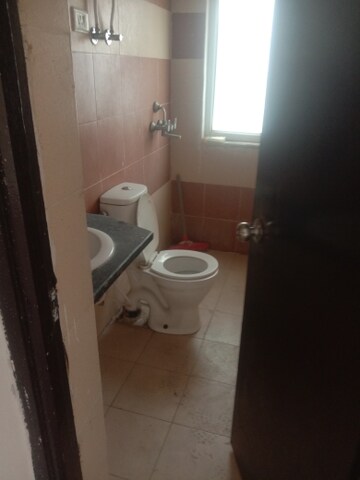 Bathroom in 2.5 BHK Apartment at Mahagun Mywoods, Sector 16c Greater Noida – for Rent