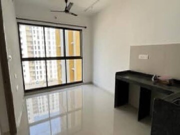 Living Room in 1 BHK Apartment at Lodha Palava City, Dombivli East – for Rent