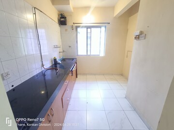 Kitchen in 2 BHK Apartment at Happy Valley, Manpada – for Rent