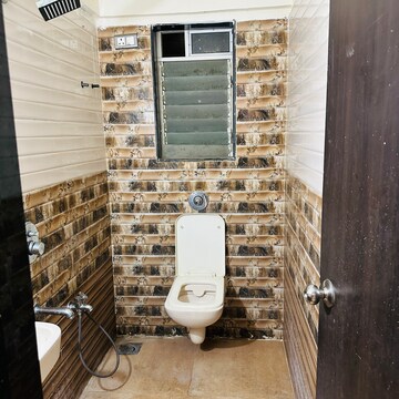 Bathroom in 2 BHK Apartment at Shraddha Evoque, Sonapur – for Rent