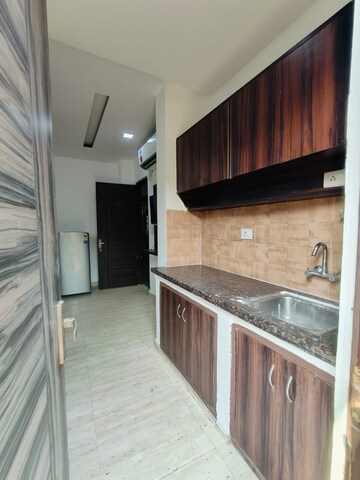 Kitchen in 1 RK Builder Floor at Ansal Sushant Lok I, Sector 43 – for Rent