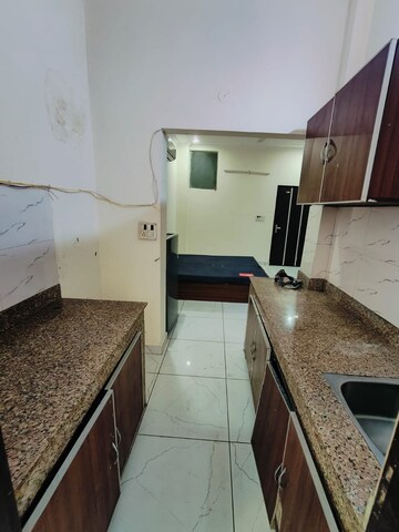 Kitchen in 1 RK Builder Floor at Ansal Sushant Lok I, Sector 43 – for Rent