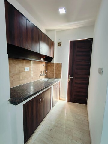 Kitchen in 1 RK Builder Floor at Ansal Sushant Lok I, Sector 43 – for Rent