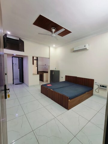 Master Bedroom in 1 RK Builder Floor at Ansal Sushant Lok I, Sector 43 – for Rent