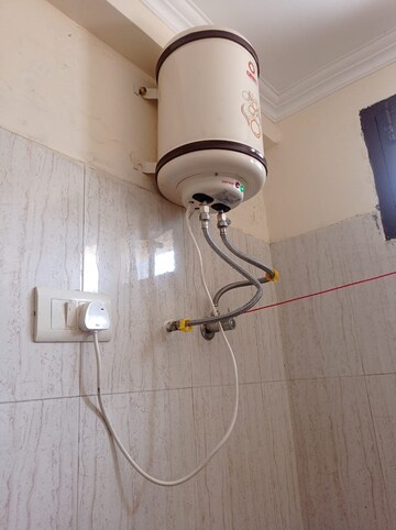 Bathroom in 2 BHK Apartment at Guru Nanak Enclave, Dhakoli – for Rent
