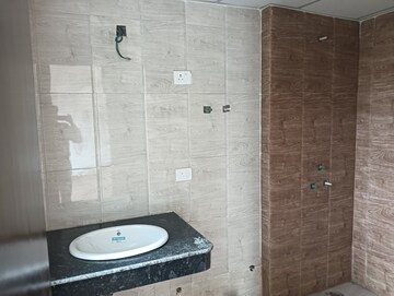 Bathroom in 2 BHK Apartment at Paras Tierea, Sector 137 – for Sale
