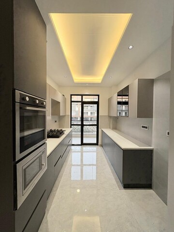 Kitchen in 4 BHK Builder Floor at Ansal API Versalia, Sector 67a – for Sale