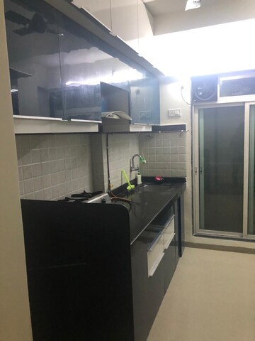 Kitchen in 2 BHK Apartment at Mahavir Kalpavruksha, Ghodbunder Road – for Rent