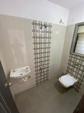 Bathroom in 1 BHK Apartment at Jashnani Chintamani Habitat, Shahapur – for Sale