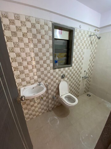 Bathroom in 1 BHK Apartment at Jashnani Chintamani Habitat, Shahapur – for Sale