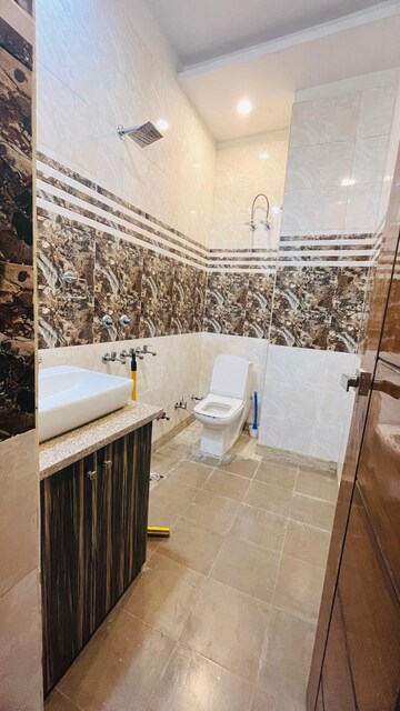 Bathroom in 3 BHK Builder Floor at BPTP Parkland, Sector 75 – for Rent