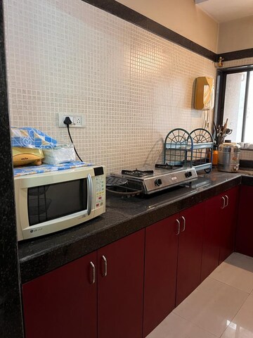 Kitchen in 2 BHK Apartment at Tharwani Heritage, Kharghar Sector 7 – for Rent