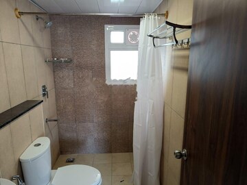 Bathroom in 3 BHK Apartment at Prestige Royale Gardens, Gantiganahalli – for Rent